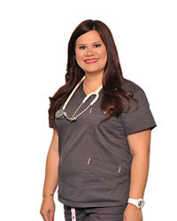 A smiling nurse wearing grey scrubs and a stethoscope around her neck